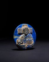 A CIRCULAR BYZANTINE LAPIS LAZULI ROUNDEL PLAQUE DEPICTING CHRIST, CIRCA 8TH-12TH CENTURY A.D.