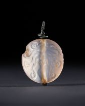 A CHALCEDONY MINOAN OCTOPUS SEA CREATURE SEAL, MIDDLE MINOAN III-LATE MINOAN I, CIRCA 1700-1500 B.C.