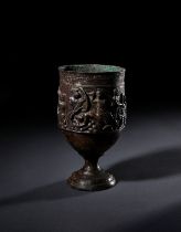 A MEDIEVAL SILVERED BRONZE CHALICE DEPICTING A GLADIATOR SCENE, CIRCA 14TH ENTURY OR LATER