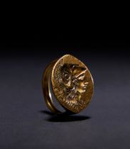 A ROMAN GOLD FINGER RING DEPICTING ATHENA, CIRCA 2ND CENTURY A.D.