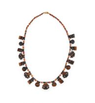 AN EGYPTIAN CARNELIAN AND BANEDED AGATE BEAD NECKLACE LATE PERIOD TO PTOLEMAIC PERIOD, 664-30 B.C.