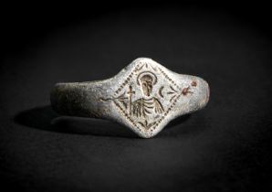 A BYZANTINE SILVER RING DEPICTING CHRIST, CIRCA 7TH CENTURY A.D.