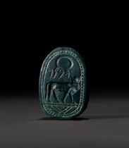 A RARE NEAR EASTERN GREEN JASPER ARAMAIC INSCRIBED BULL SCARAB, 8TH-7TH CENTURY B,C,