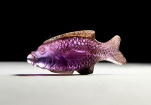 A ROMANO EGYPTIAN AMETHYST FISH LATE PTOLEMAIC PERIOD TO ROMAN PERIOD, CIRCA 1ST CENTURY B.C.- 1ST C