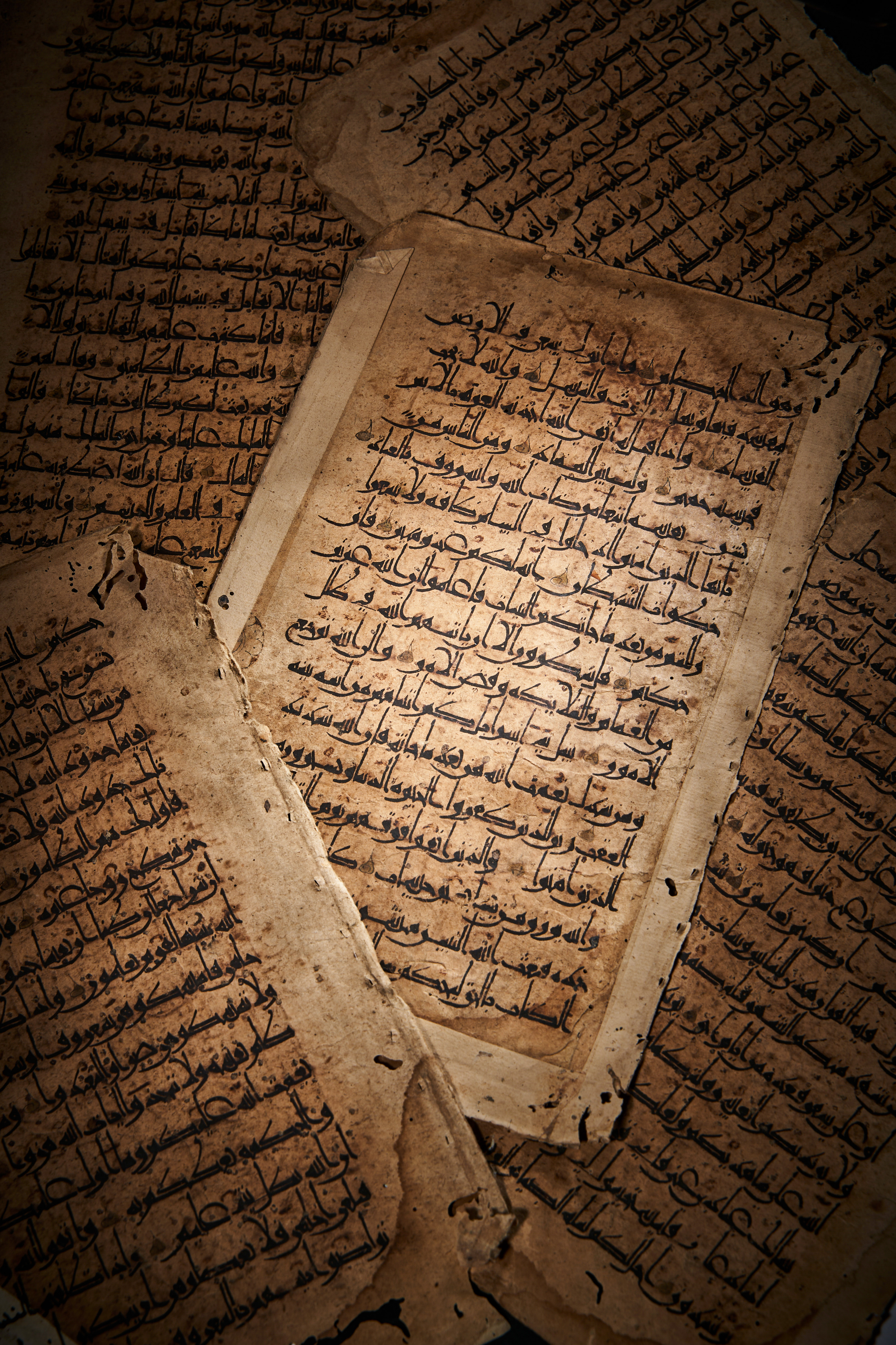 A CONSECUTIVE EASTERN KUFIC QURAN SECTION, NEAR EAST, 12TH CENTURY