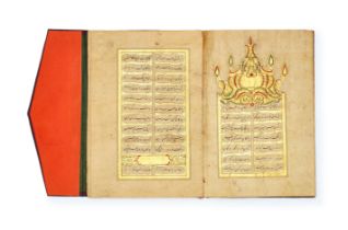 AN ILLUMINATED QURAN SECTION COPIED BY MUHAMMAD NURI, STUDENT OF HASSAIN AL-WEHBI