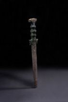 A BRONZE AND SILVER INLAID INSCRIBED DAGGER, PROBABLY NEAR EASTERN