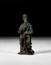 A GREEK BRONZE STATUE OF A SEATED MAN, PROBABLY MOSES