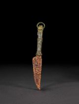 AN ISLAMIC BRONZE DAGGER