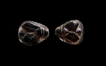 A PAIR OF BLACK ROCK CRYSTAL EGYPTIAN LOCUST AMULETS NEW KINGDOM, DYNASTY XVIII (1390-1327 B.C.)