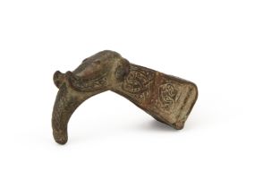 A BRONZE INSCRIBED HAMMER HEAD IN THE FORM OF AN ELEPHANT, PROBABLY 12TH SELJUK