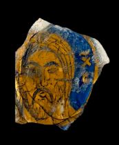 A BLUE ENAMELLED GOLD-DECORATED SANDWICH GLASS DEPICTING CHRIST