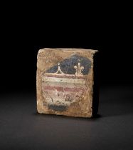 A ROMAN POMPEII POLYCHROME WALL FRAGMENT CIRCA 1ST CENTURY A.D.