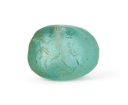 A LARGE BLUE GLASS SASANIAN STAMP SEAL CIRCA 4TH-5TH CENTURY A.D.