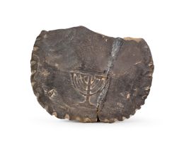 A GREY SCHIST ARAMAIC INSCRIBED MENORAH STONE, 8TH-7TH CENTURY B,C,