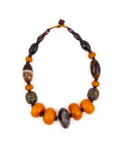 A TIBETAN AMBER & AGATE DZI BEAD NECKLACE