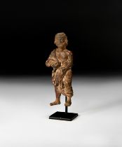 A GANDHARAN BRONZE FIGURE OF A STANDING DEITY, CIRCA 2ND CENTURY