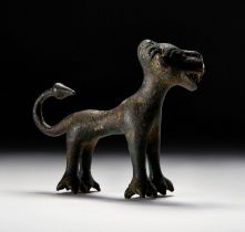 AN ELAMITE BRONZE LION CIRCA LATE 3RD MILLENNIUM B.C.