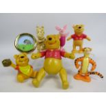 5 vintage plastic Disney Winnie the pooh figures etc.