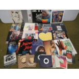 30 plus Vinyl LP's plus approx 10 Singles . All rock and pop genre.