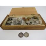 Wooden box containing various coins including a 1816 George III Shilling.
