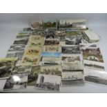 Over 70 Vintage postcards including embroided WW2 but mainly topographical.