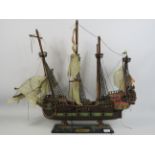 Vintage wooden model Galeon ship, approx 46cm tall and 53cm long.