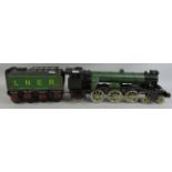 Tin plate model of the Flying Scotsman with carriage 66cm long and 13 cm tall.