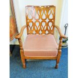 Arts & Crafts style small oak armchair with upholstered seat squab over sprung base. See photos.
