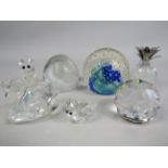 3 Swarovski and 2 Caithness paperweights plus 2 others.