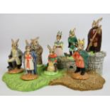 Royal Doulton Bunnykins The Robin Hood collection 8 figurines and base. No boxes for figurines but