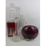 3 Crystal glass decanters plus a art glass jug and vase.