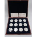 Boxed set of 12 Silver plated Cupro Nickel coins 'British Military Aircraft. See photos.