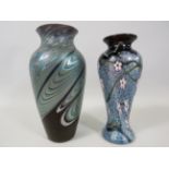 2 Okra studio art glass vases approx 17cm tall one has chips to the rim.