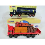 Two boxed and unused Corgi Classics Scammel Highwayman plus a Foden Flatbed with barrels and chains.