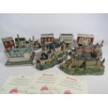 5 Danbury mint castles and 4 Home town America houses,