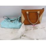 2 Ladies Moda Hanbags with dust bags in unused condition.