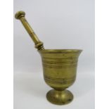 Brass pestal and mortar, the bowl is approx 5" tall.