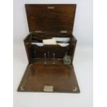 A vintage wooden table stationery / writing box. 9.75" tall, 14.5" long and 8.5" deep.