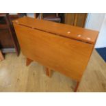 Handy sized late 20th Century Space saver drop leaf table