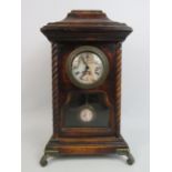 Reproduction quartz mantle clock which stands approx 36cm tall.