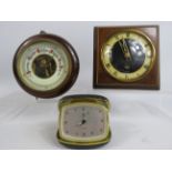 Vintage Oak cased enamel face barometer plus a vintage mantle clock and travel clock.
