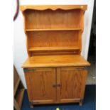 Nicely made pine dresser with exposed decorative iron hinges