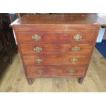 Mid 19th Century Oak Four drawer chest raised on Turned feet with brass handles