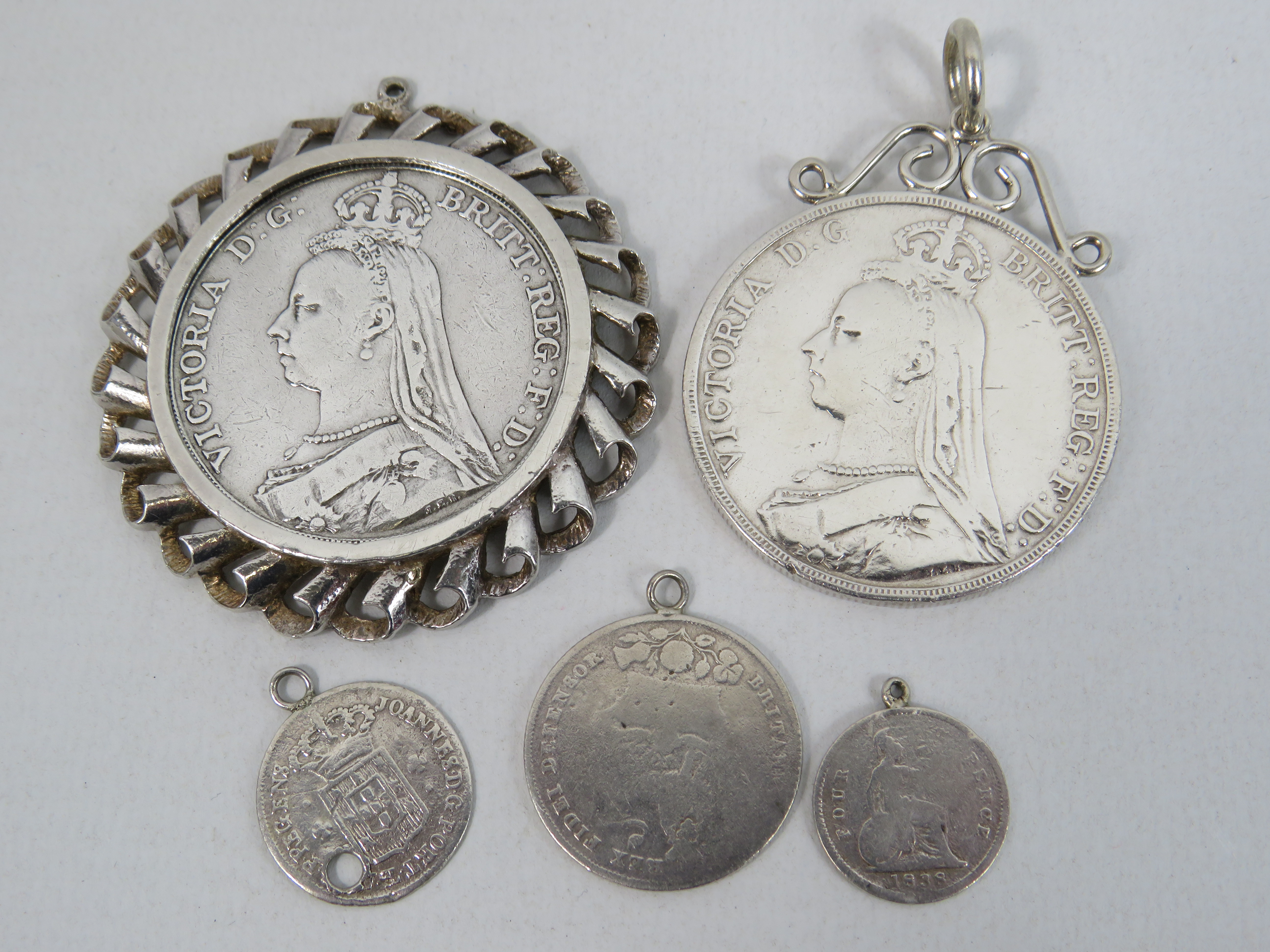 2 Mounted 1899 Queen Victoria silver Crowns plus 3 small silver coin pendants. Total weight 80.4 - Image 2 of 2