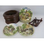 8 Wedgwood Life on the farm plates plus 6 wooden plate frames and 2 plate racks.