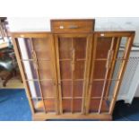 Interesting art deco style oak made glass fronted display cabinet.