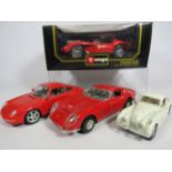 Boxed and Unused Burago Ferrari Testarossa together with other large die cast models which are