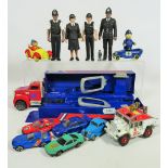 Selection of Matchbox and Corgi die cast vehicles plus plastic policemen. See photos.