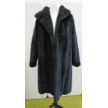 Vintage faux fur long coat by Lister Minquilla. Approx size 14.